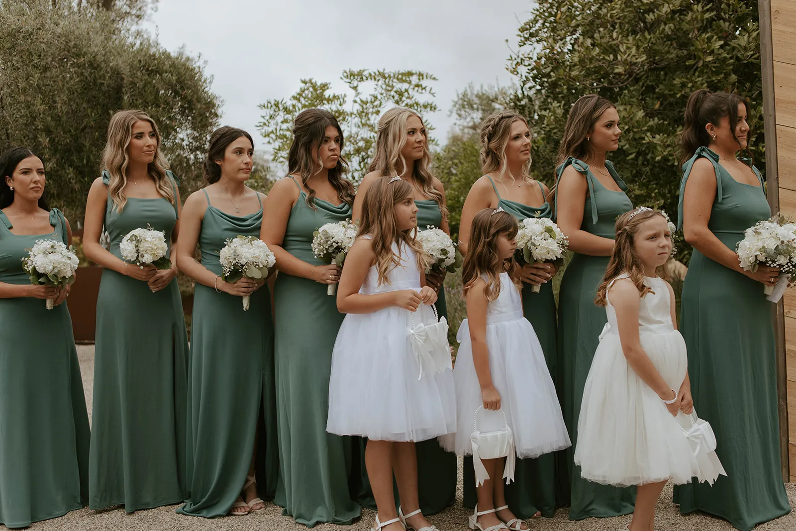Bridesmaids in sage green dresses